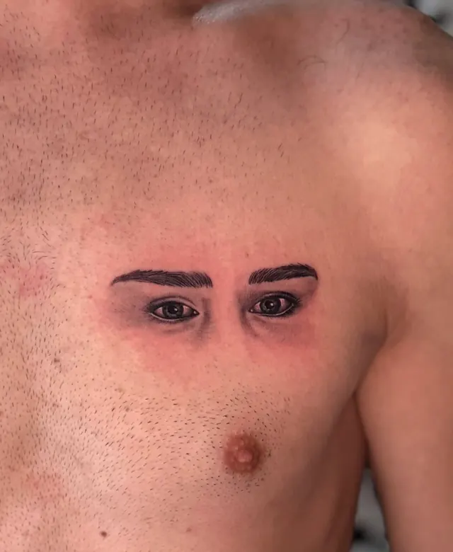 Realistic pair of eyes on the chest
